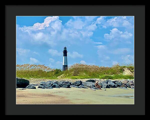 Lighthouse by a Tranquil Shoreline - Framed Print