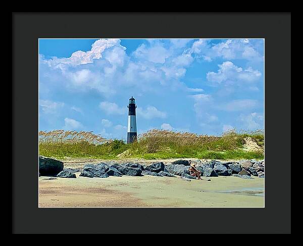 Lighthouse by a Tranquil Shoreline - Framed Print