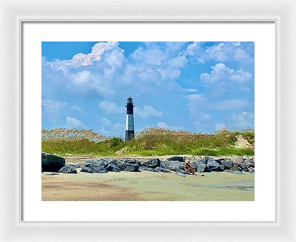 Lighthouse by a Tranquil Shoreline - Framed Print